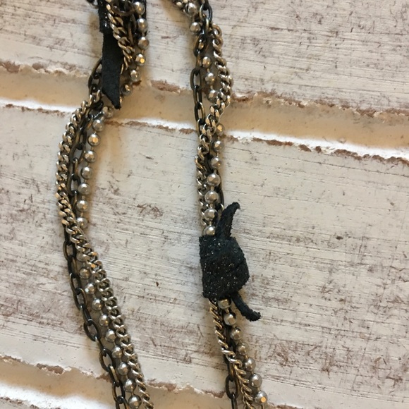 Long multi chain necklace with leather accent. - Picture 5 of 5